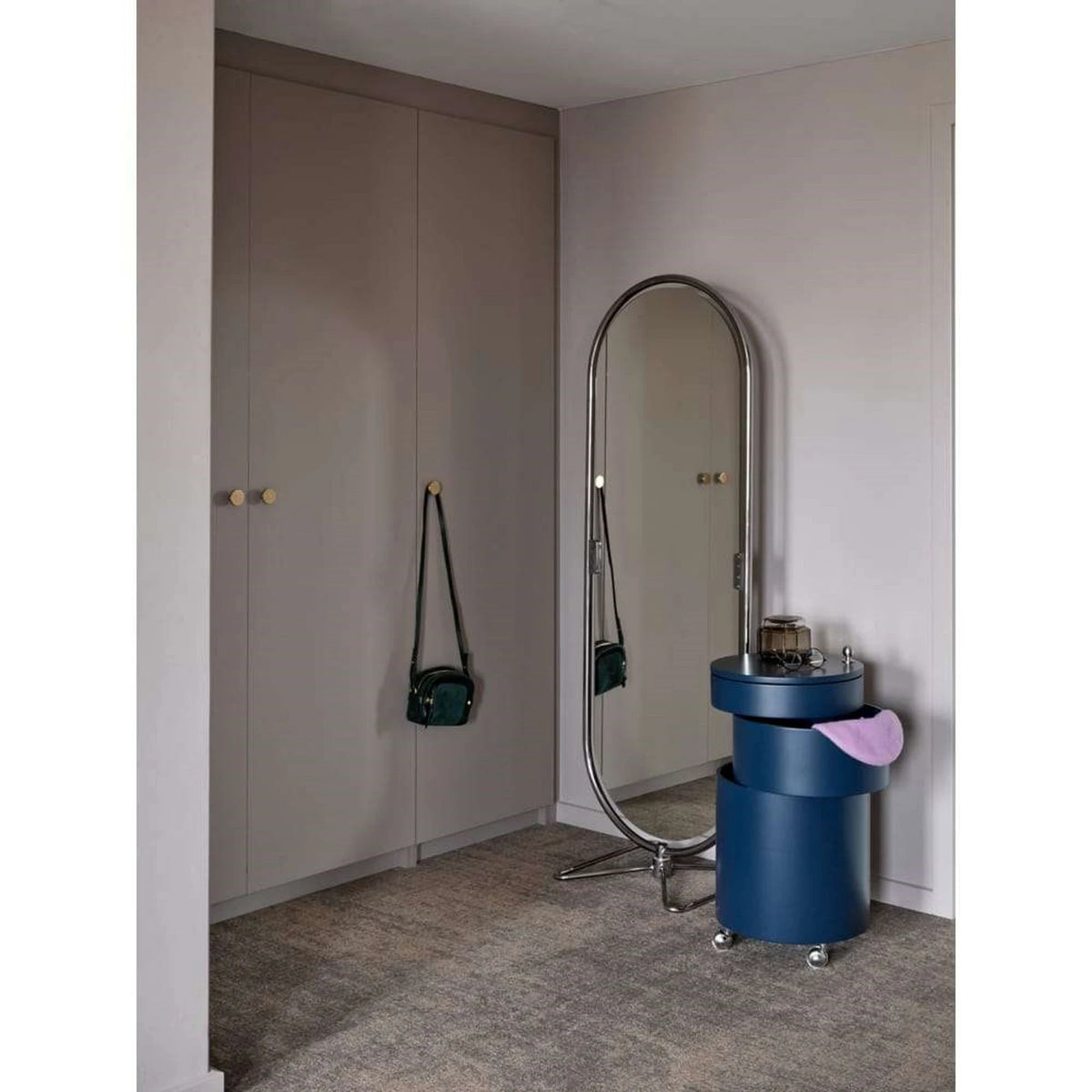 SWIVEL Bar Cabinet — cylindrical, on castors, navy / petrol