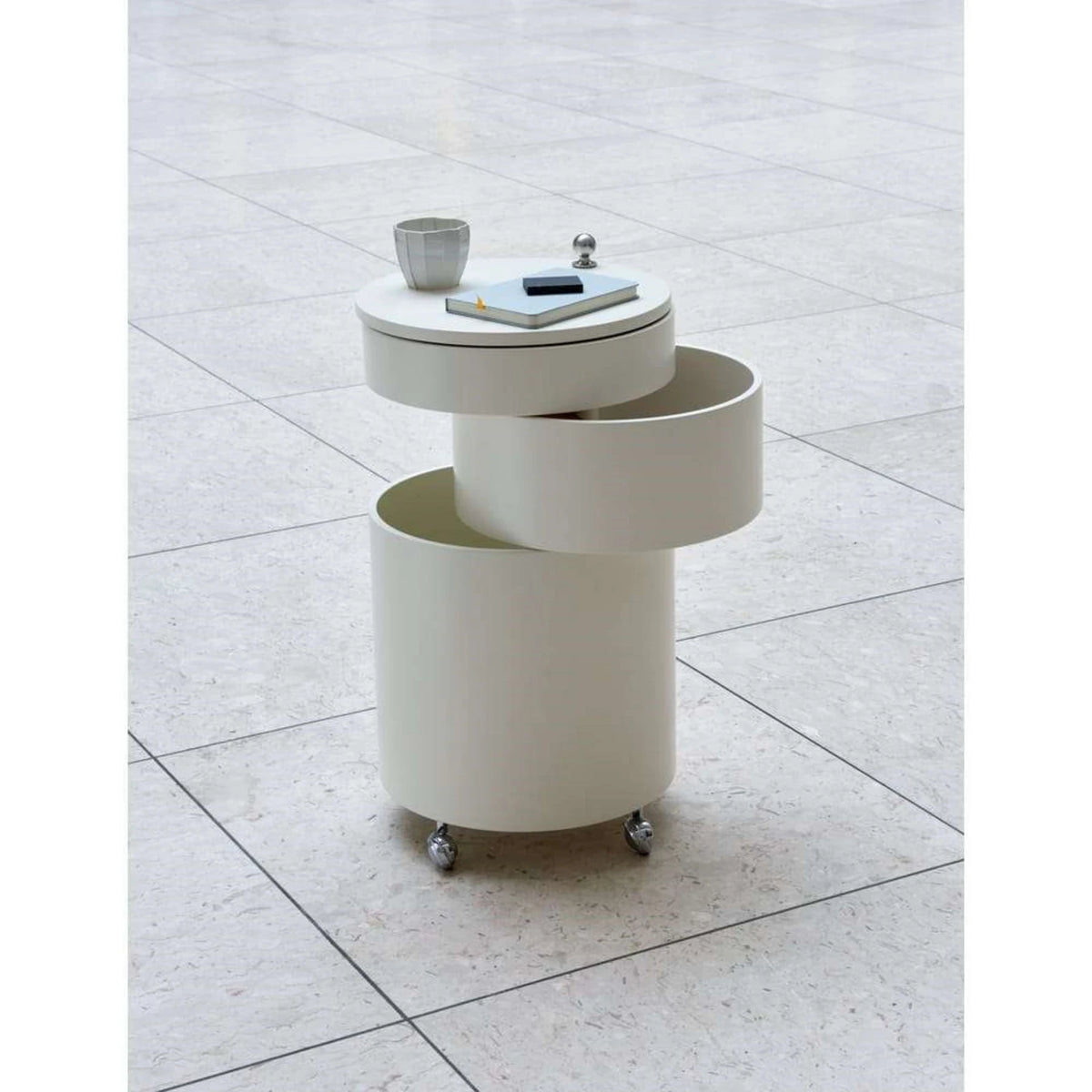 SWIVEL Bar Cabinet — cylindrical, on castors, white